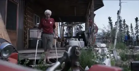 andy bassich after an accident in crutches