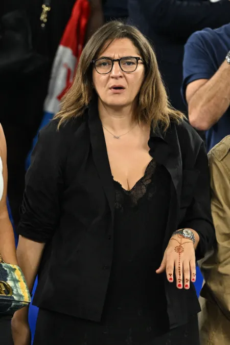 fayza lamari attending a game