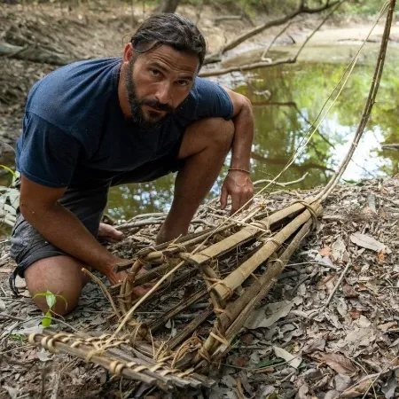 hazen audel catching a wolf fish in suriname during 2022 expedition