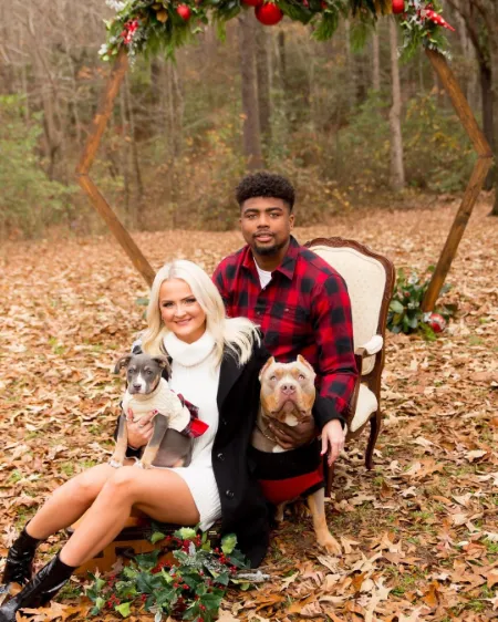 Treylon Burks Wife Shelby Pearlman Parents, Age, Net Worth 2023, Ig 1 shelby pearlman with her husband and pet dogs